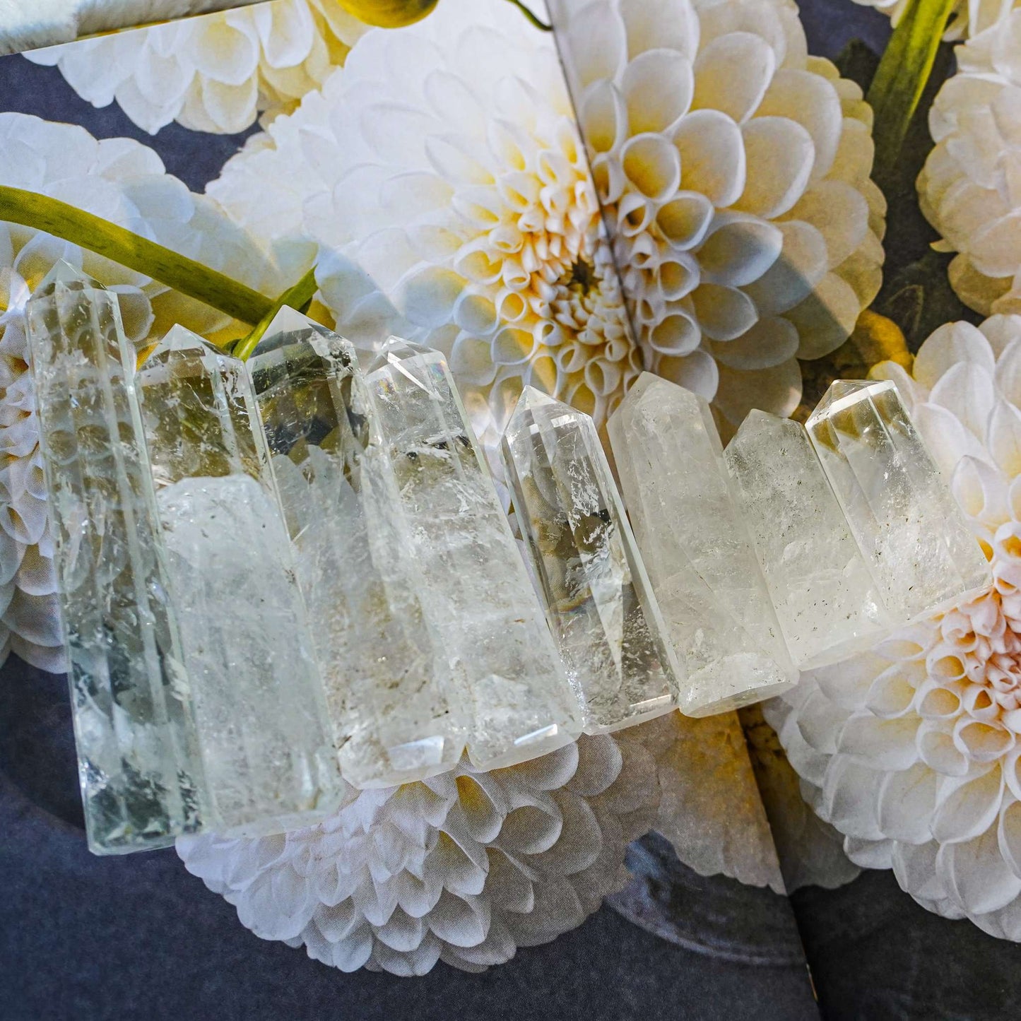 Apophysllite crystal specimen placed on book