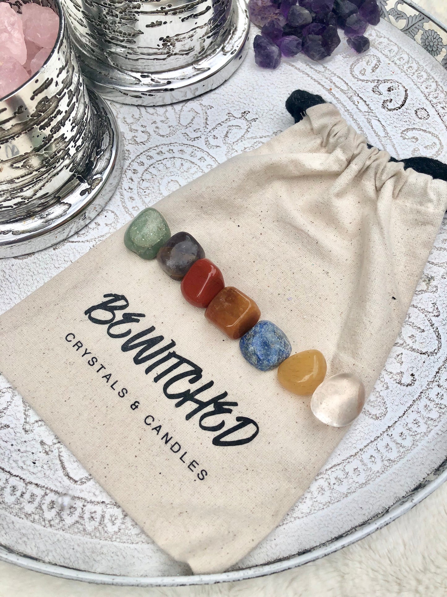 Arrangement on chakra stones on branded bloth bag