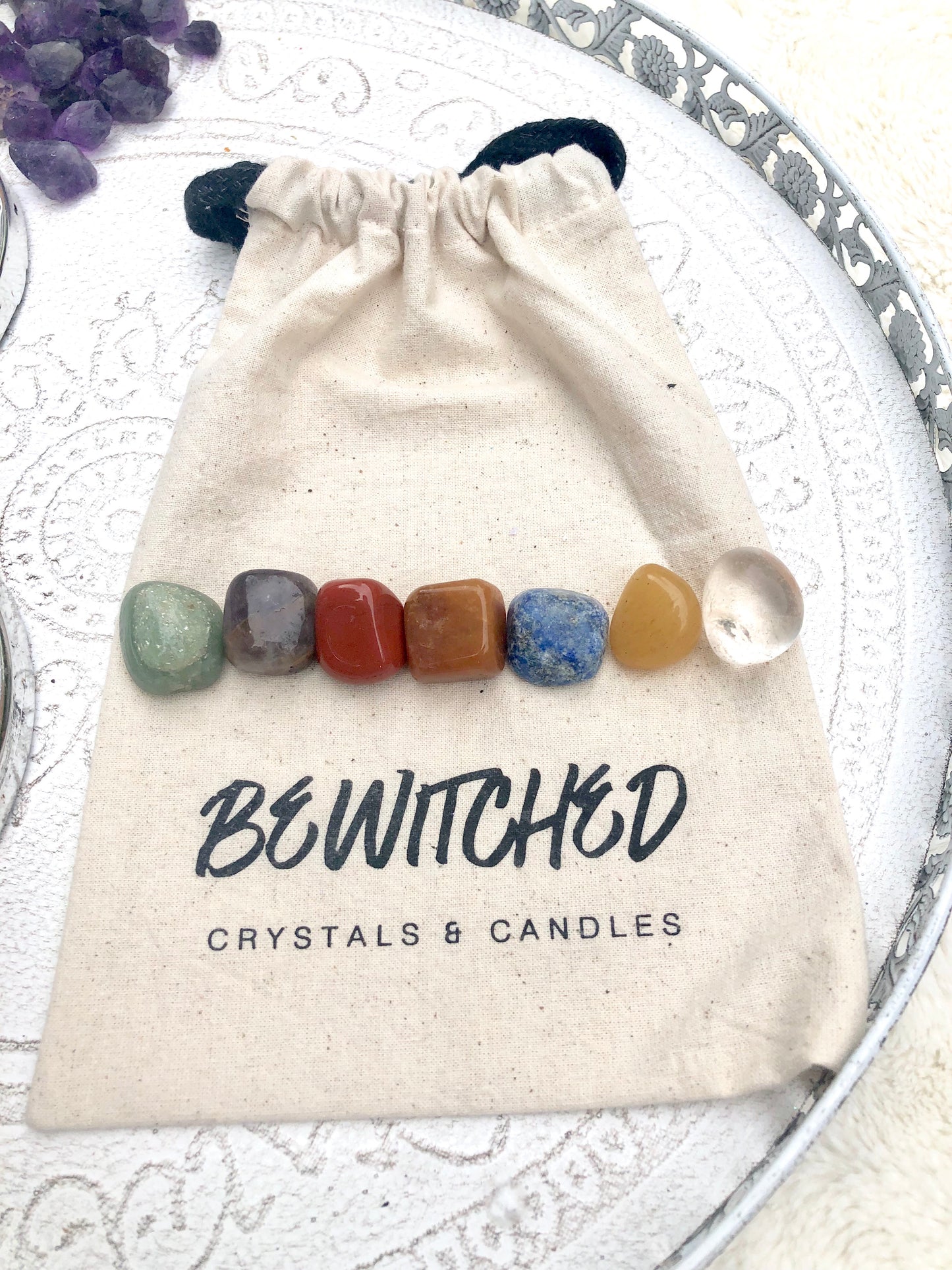 Arrangement on chakra stones on branded bloth bag