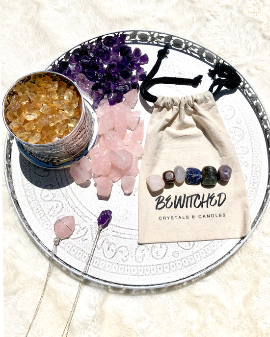 Anxiety crystal kit crystals on branded cloth bag with collection of citrine, amethyst and necklaces