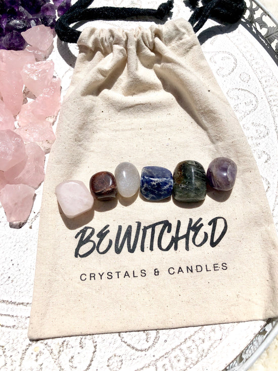 Anxiety crystal kit crystals on branded cloth bag