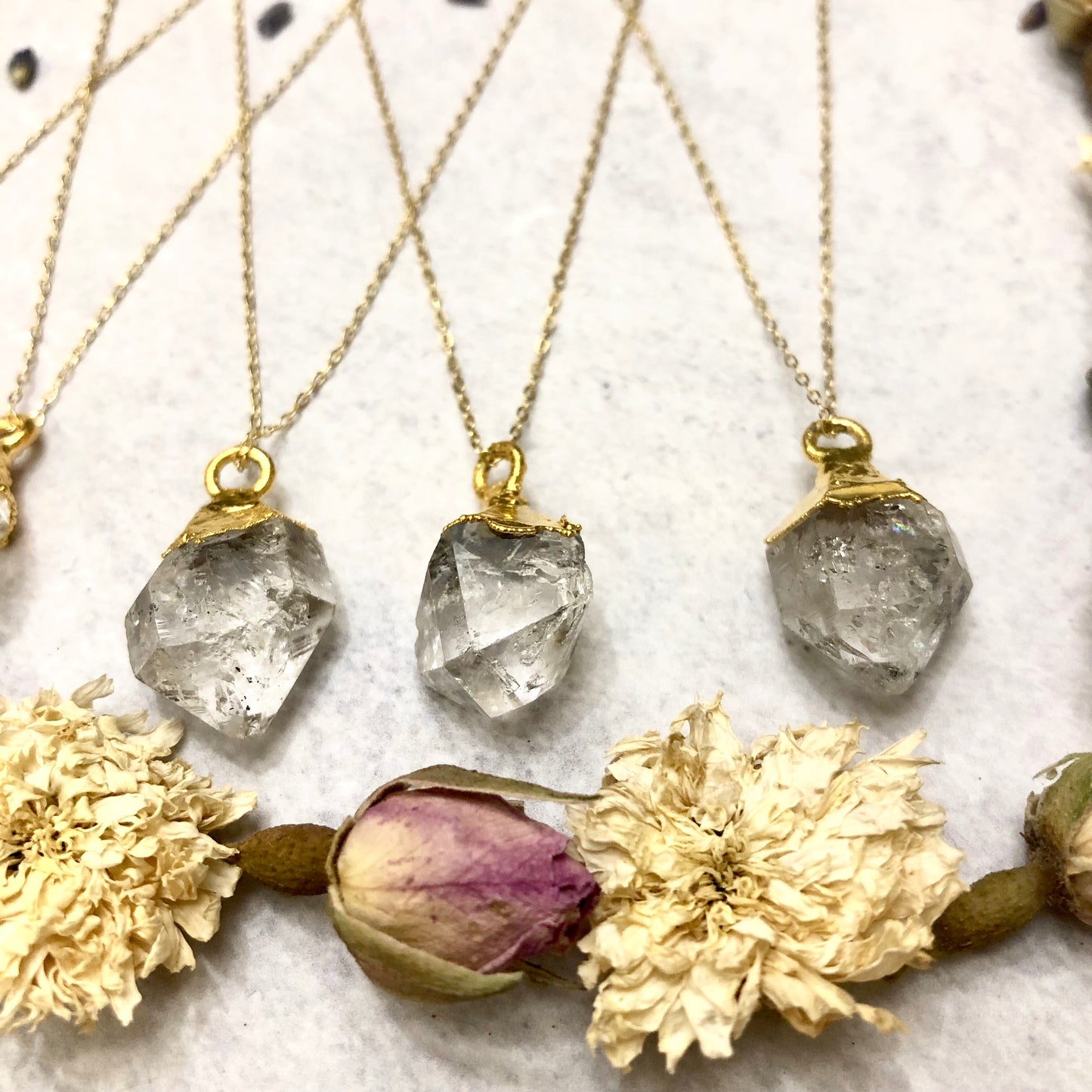 Herkimer diamond earrings with flowers below