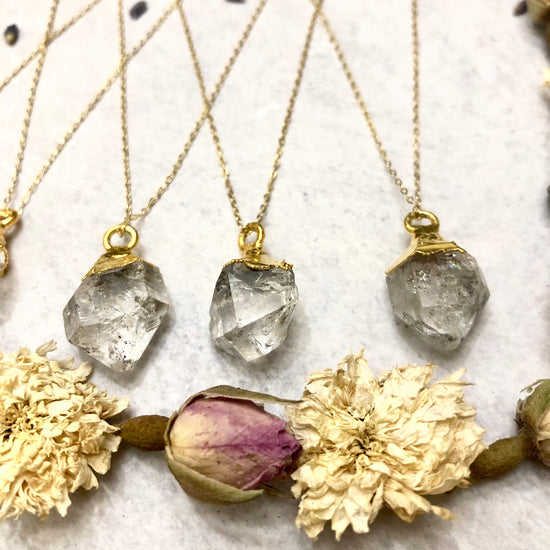 Herkimer diamond earrings with flowers below