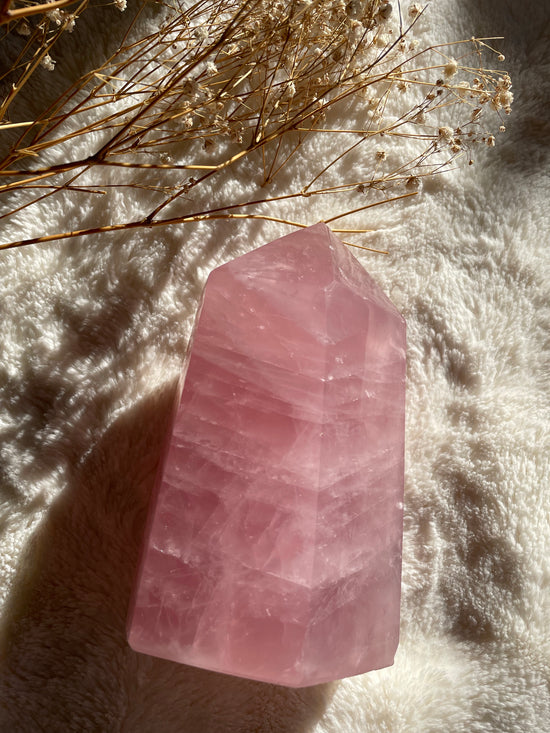 Rose quartz crystal point
